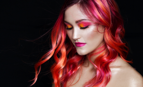 Pink and Orange ombre hair from cosmetology student